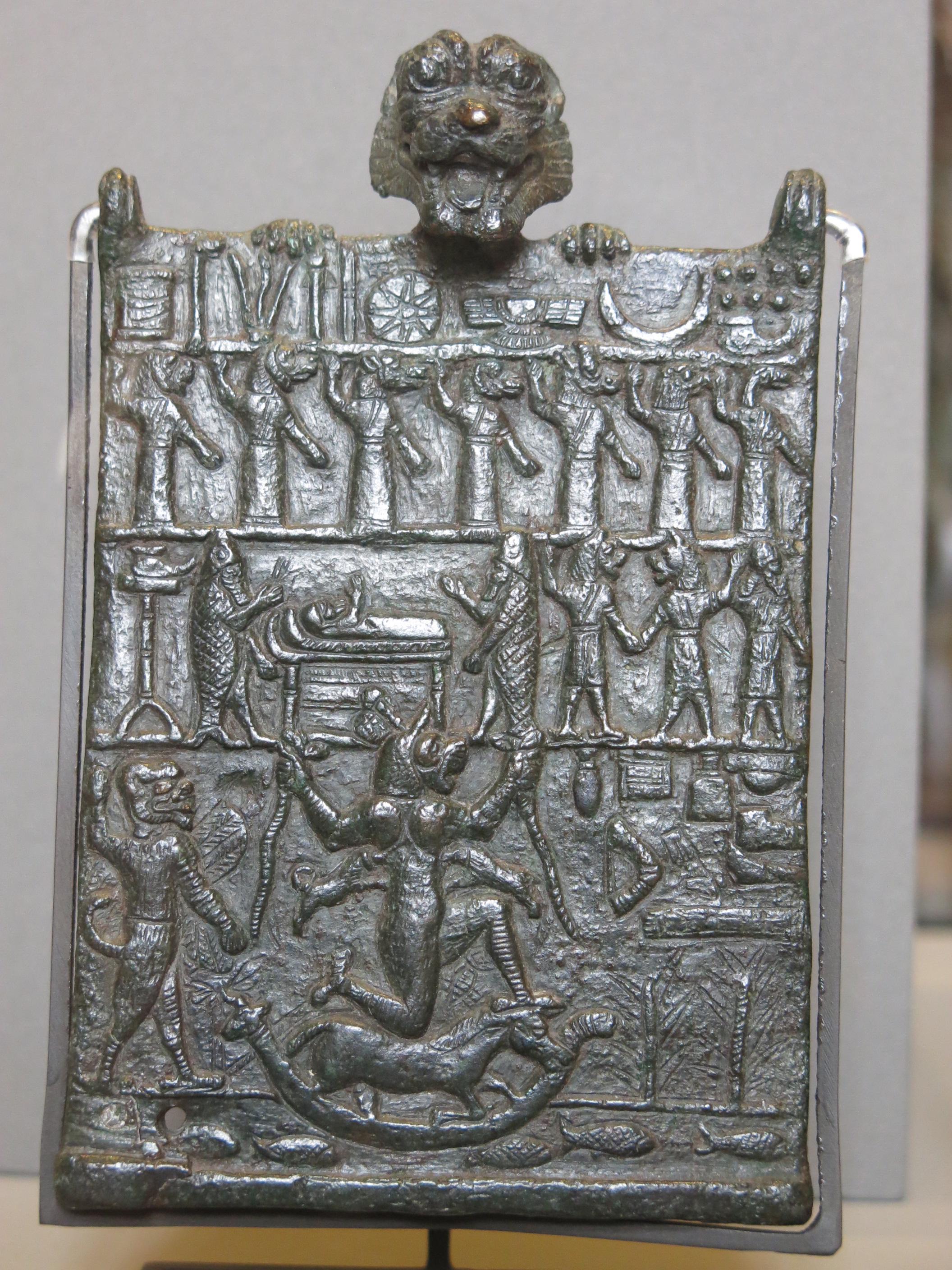 Bronze Lamashtu plaque held by the demon Pazuzu,(c.1st century B.C.E.,the Louvre, Paris). Pazuzu was invoked for protection against the goddess Lamashtu in Mesopotamian mythology.jpeg