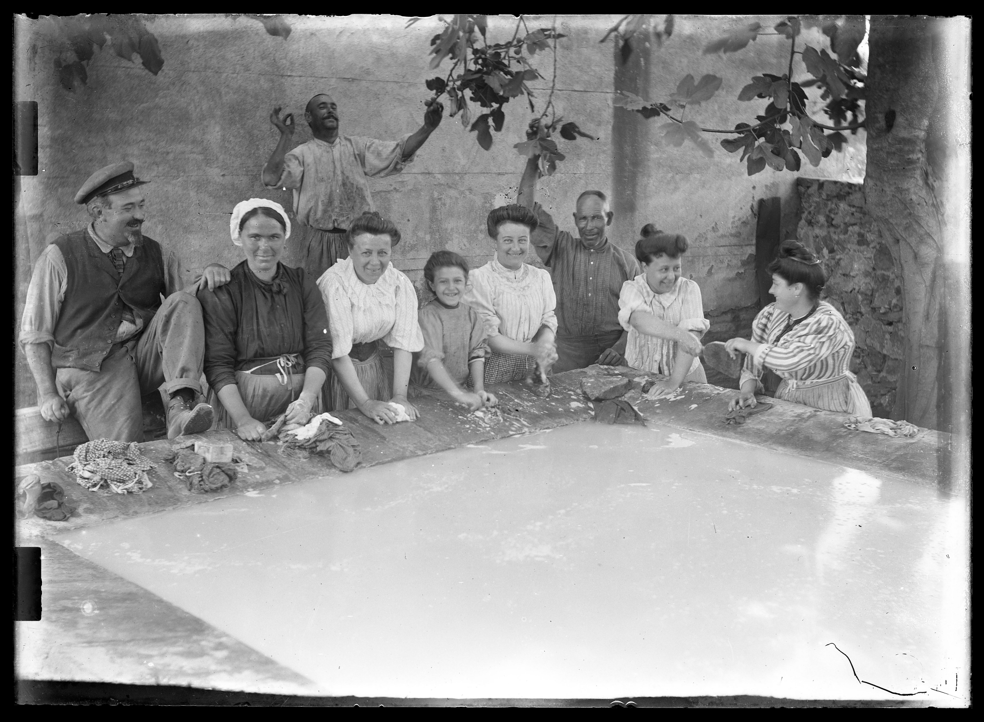 Rural family doing washing. France 1900s. Glass Negative.jpeg
