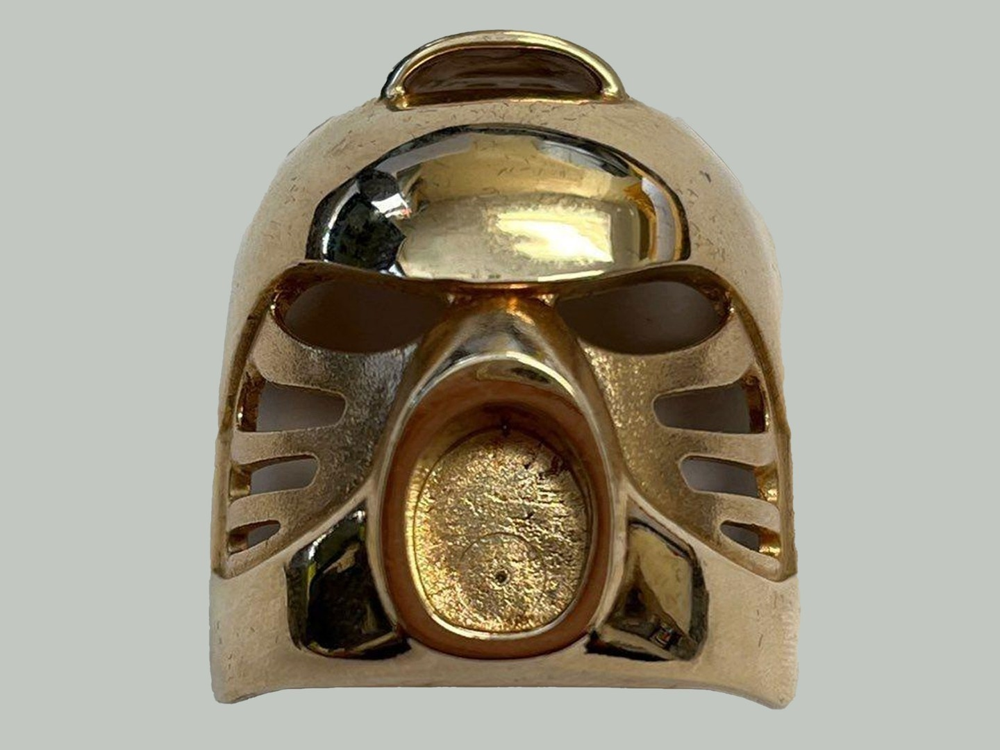 Rare 14-karat gold Kanohi Hau mask from Lego’s now discontinued Bionicle collection (Circa 2000). The item was recently sold for over $18,000 USD at auction.png
