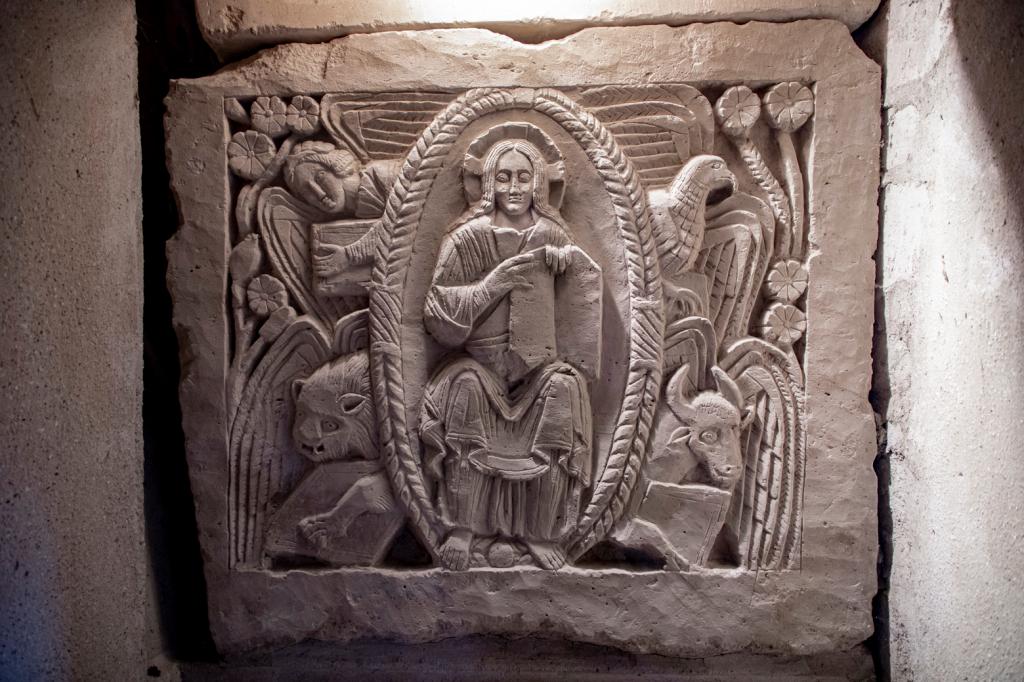 Merovingian (7th century) bas-relief of Christ surrounded by symbols of the 4 evangelists, from the sarcophagus of St. Agilbert in the St. Paul crypts, Jouarre, France.jpeg