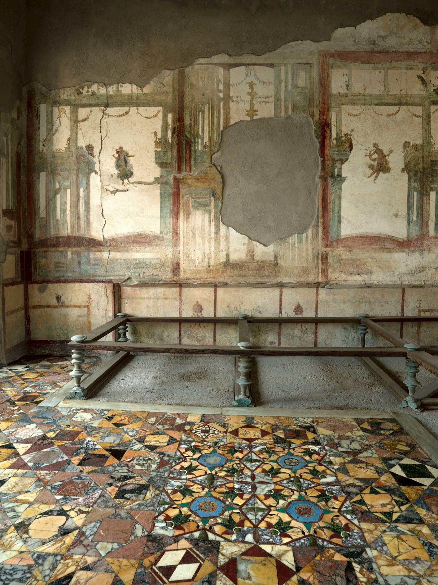 Marble tiled floor (opus sectile) of the triclinium of Casa dell'Efebo in Pompeii, Italy.jpeg