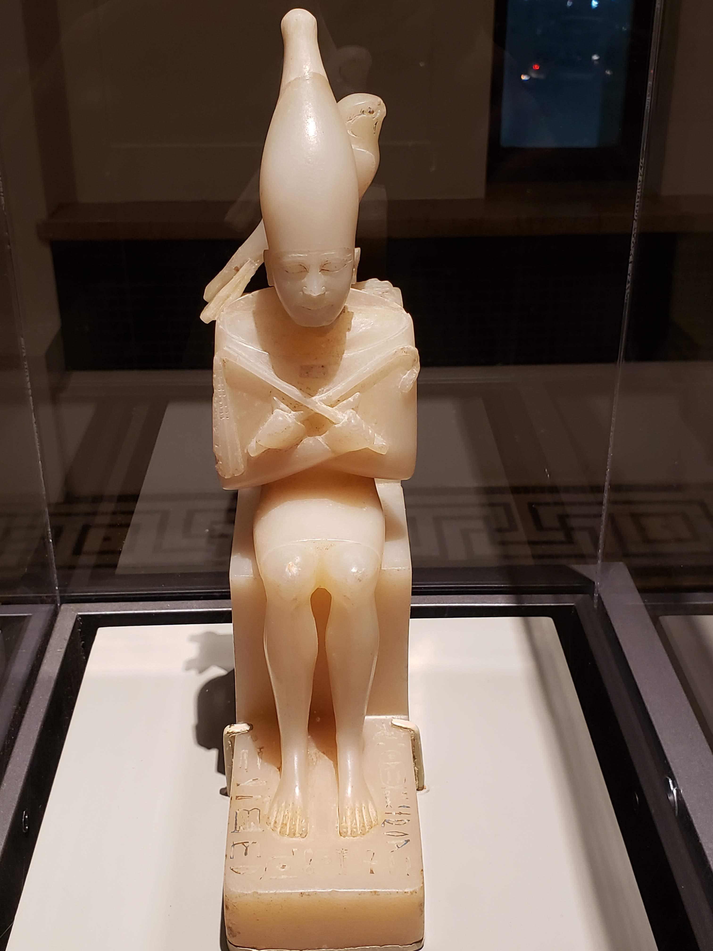 Seated statuette of Pepy I with Horus falcon. Egyptian alabaster with pigment and gypsum. Old Kingdom, dynasty 6, ca. 2338-2298 BC. Brooklyn Museum collection.jpeg