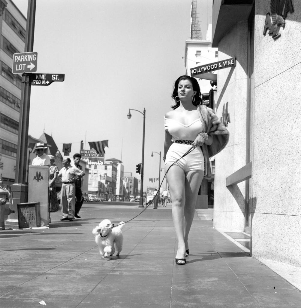 Joan Bradshaw turns heads on Hollywood Boulevard, 1957.jpeg