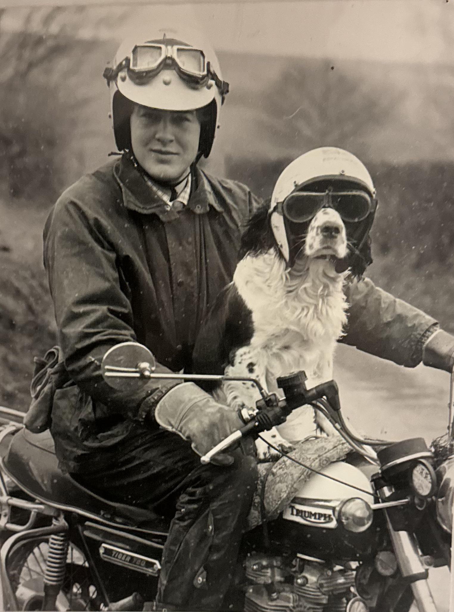 My dad in the 80’s, with a motorcycle riding spaniel.jpeg