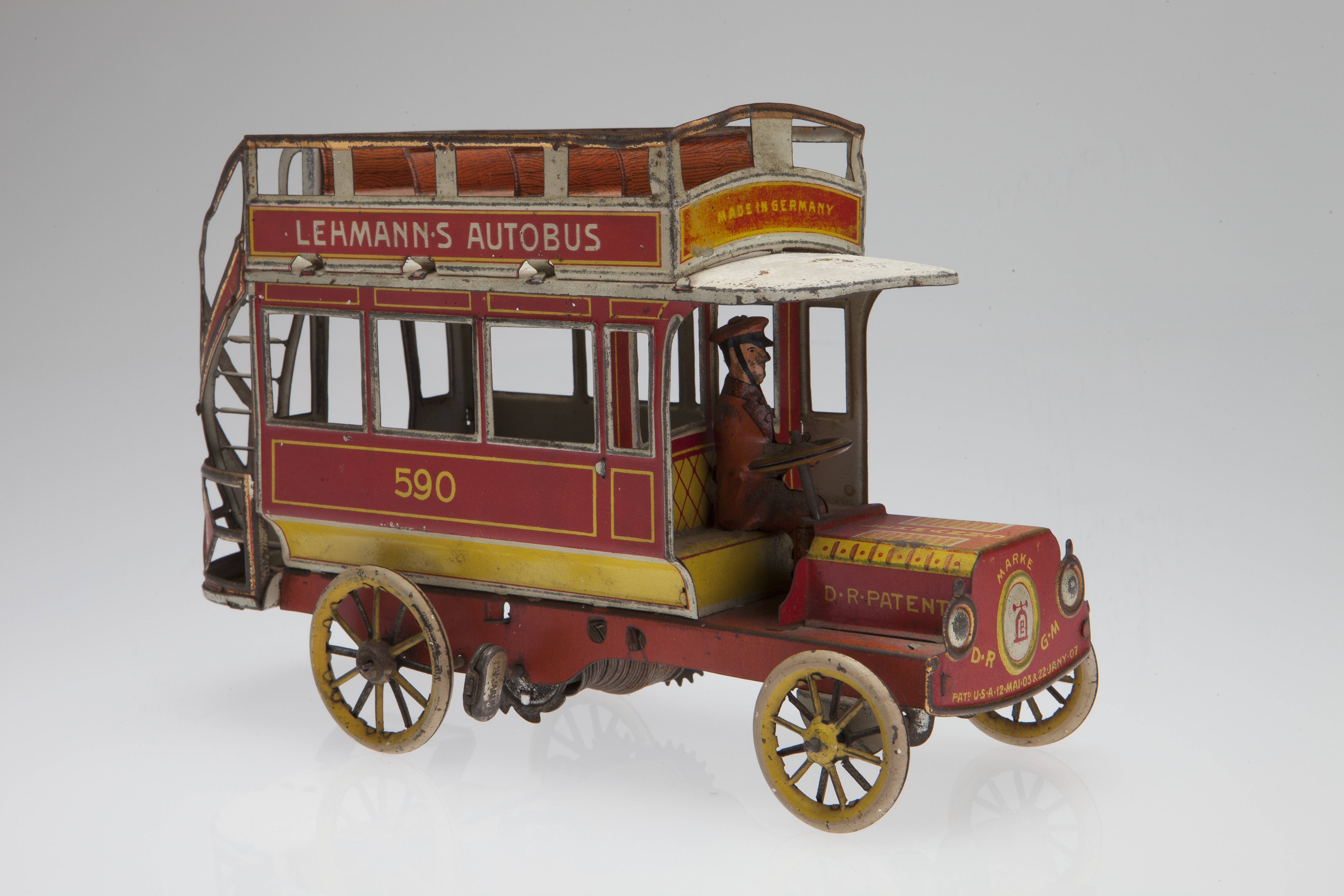 Lithographed tin mechanical toy double decker bus produced by the Lehmann Company in Germany, c. 1907-1915.jpg
