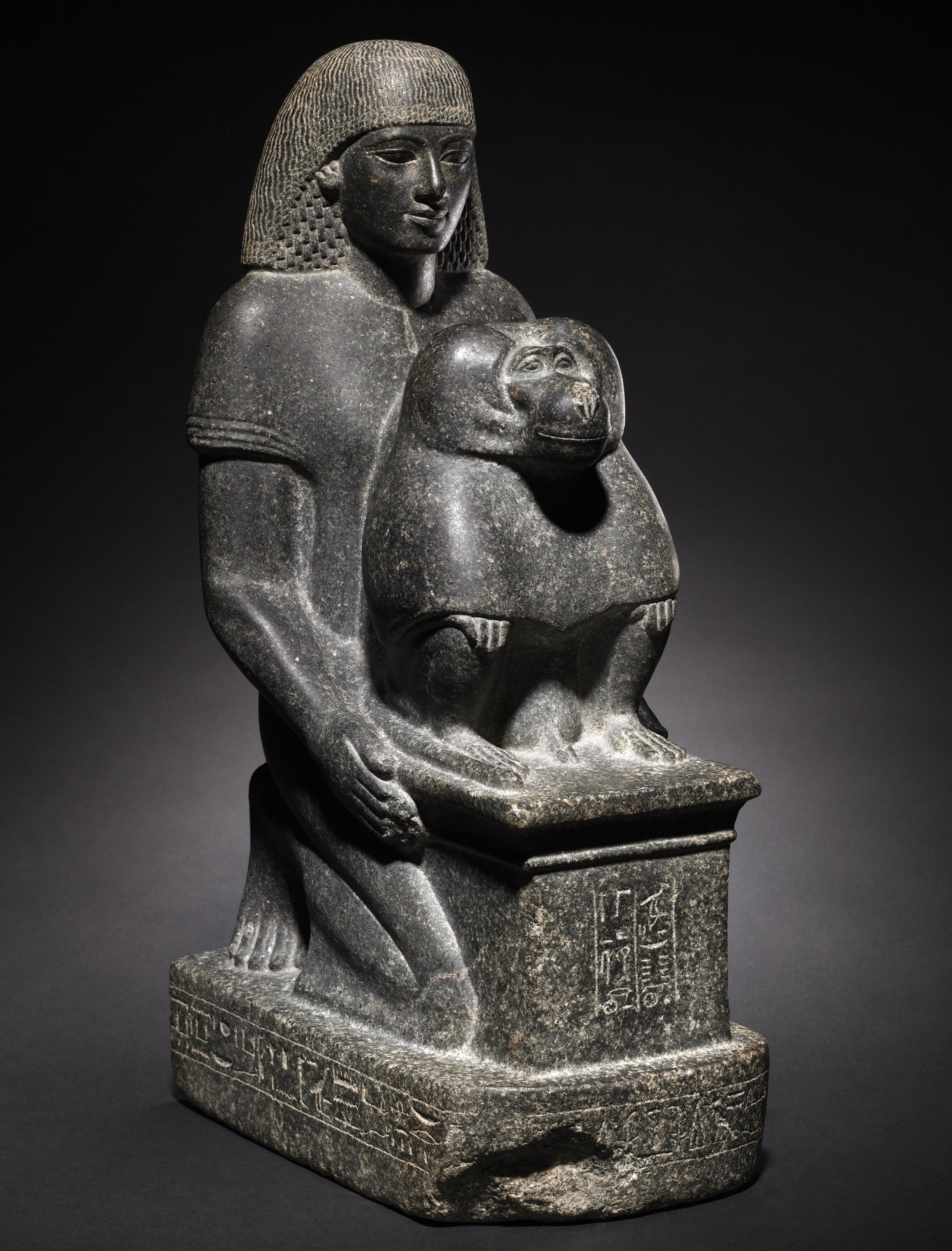 Statue of Minemheb, with the god Thoth in baboon form. Egypt, New Kingdom, 1391–1353 BC.jpeg