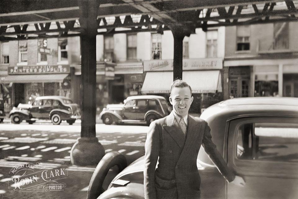 Step back in time with this striking mid-1940s snapshot from NYC, featuring a man in a snazzy suit outside his car. This photo captures the essence of post-war fashion and automotive style.jpeg