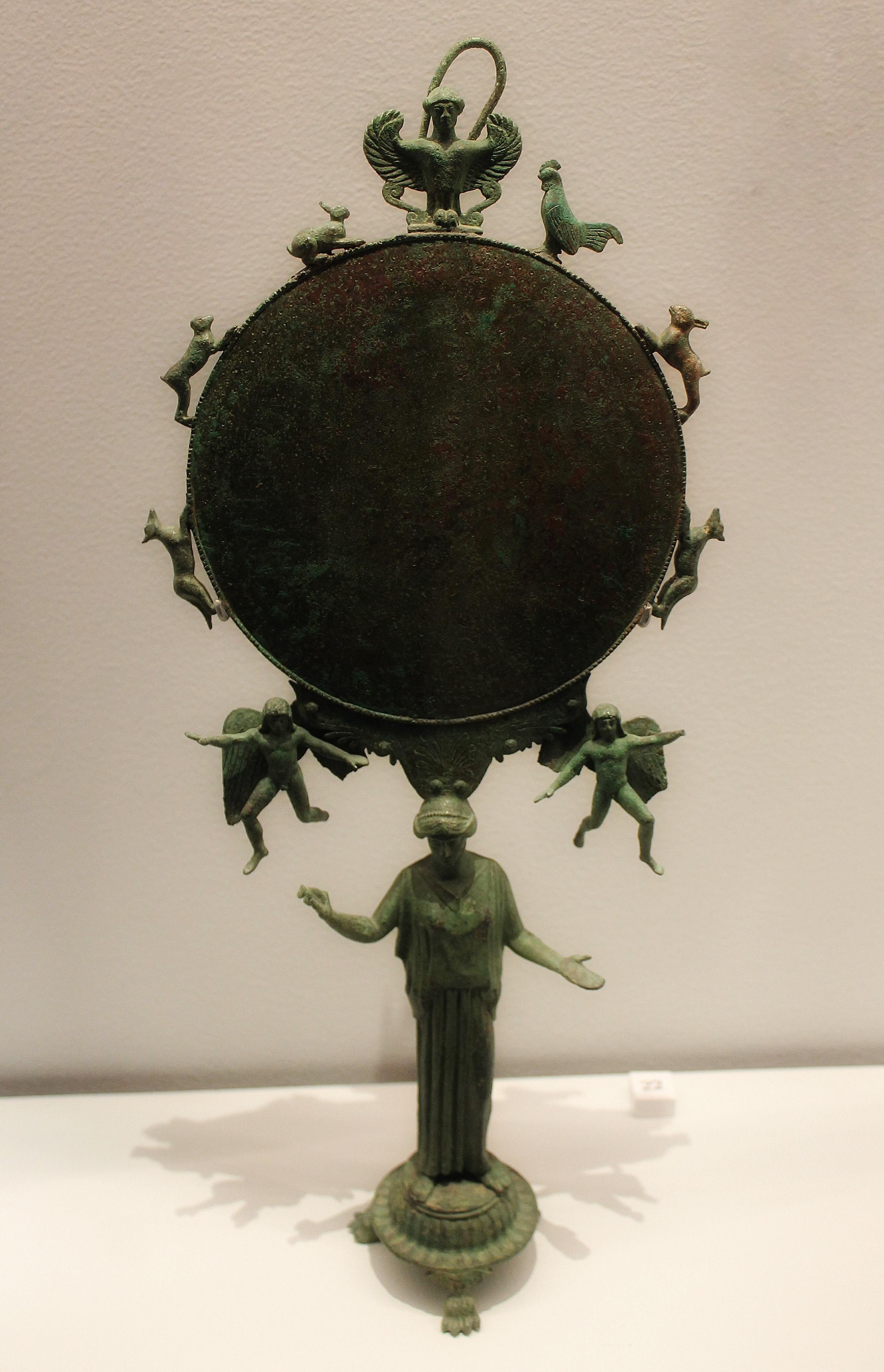 This bronze mirror at the Louvre Abu Dhabi was the height of luxury in Ancient Greece. It probably would be today, too.jpg