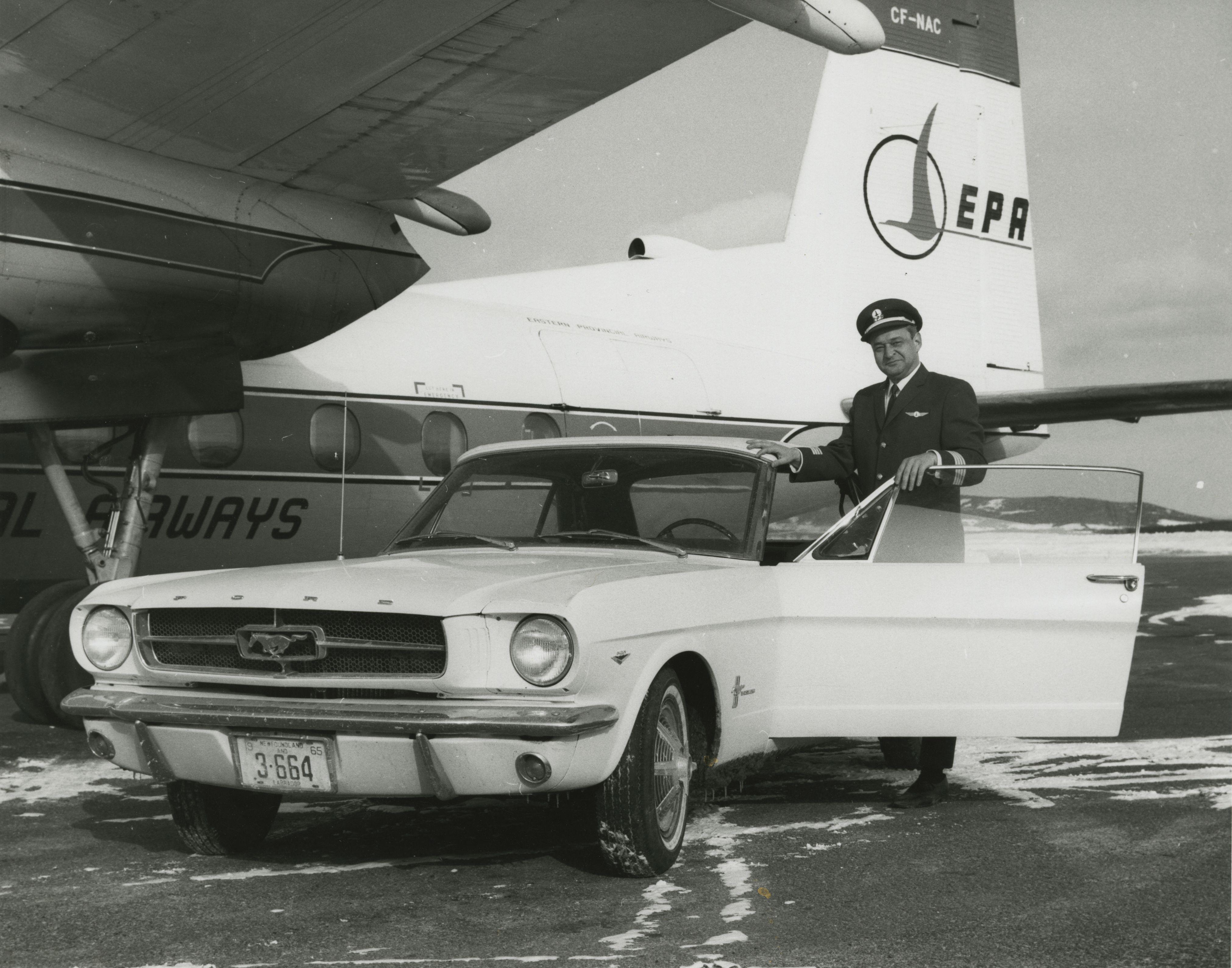 Captain Stanley Tucker, the first ever person to buy a Ford Mustang, and his beloved car, which was also the first Mustang ever made, 1966.jpeg