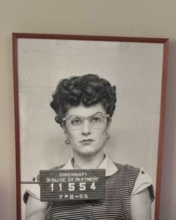 Woman decided to display her old mugshot photo in her home, such a badass.png