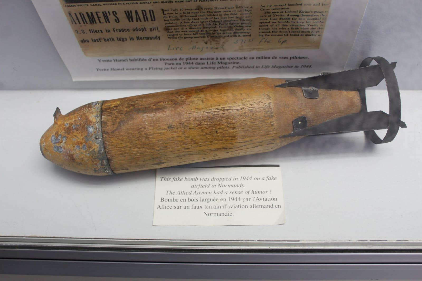 Fake wooden bomb dropped by Allies on a fake German airfield filled with fake wooden planes in WW2.jpeg