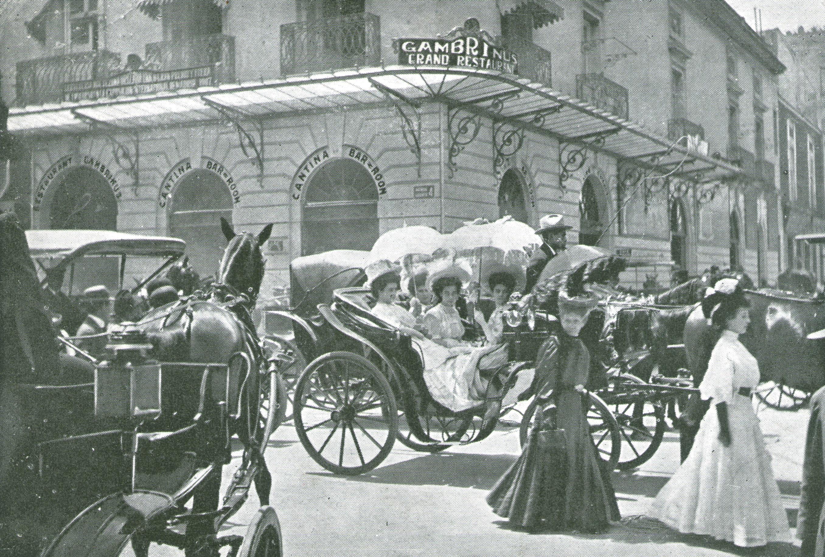 Ladies in horse carriage pass by the front ot the Restaurant Gambrinus. Others walk past them. Mexico, City, Mexico, Circa 1900-10s.jpeg