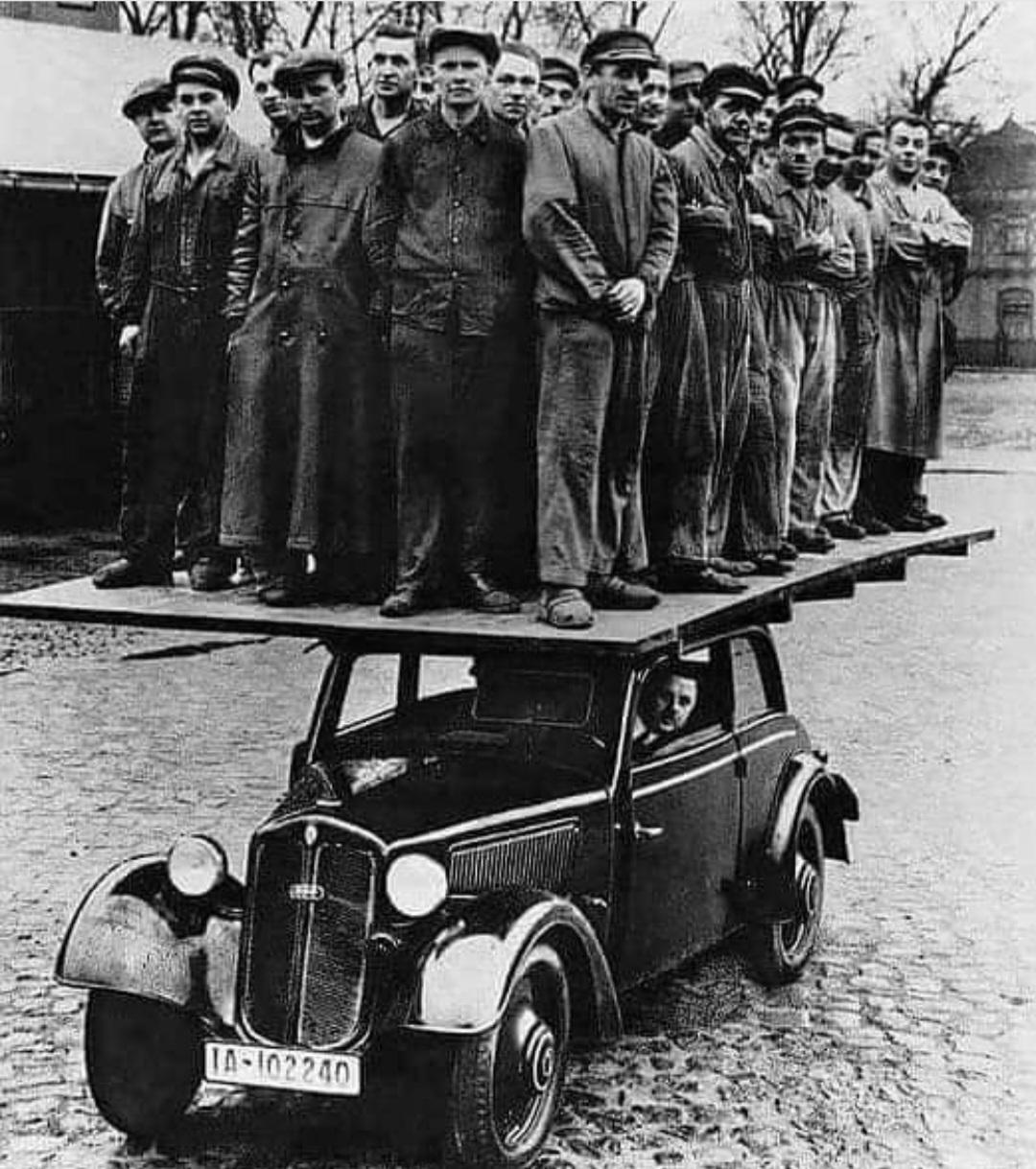 Audi workers testing the body strength of an Audi 920. c.1938.jpeg