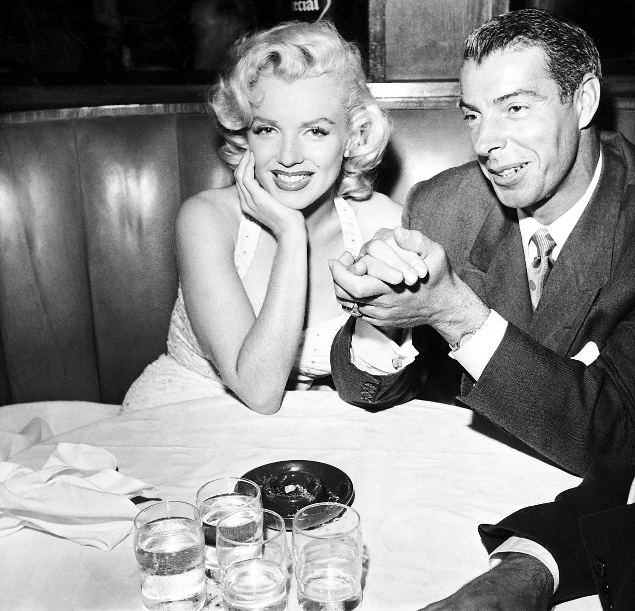 Marilyn Monroe and Joe DiMaggio on a date at Chasen’s Restaurant in Los Angeles, California on June 26, 1953.jpeg