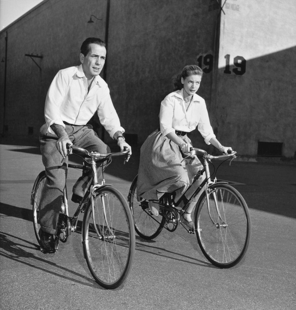 Humphrey Bogart & Lauren Bacall bicycle ride, around 1948.jpeg