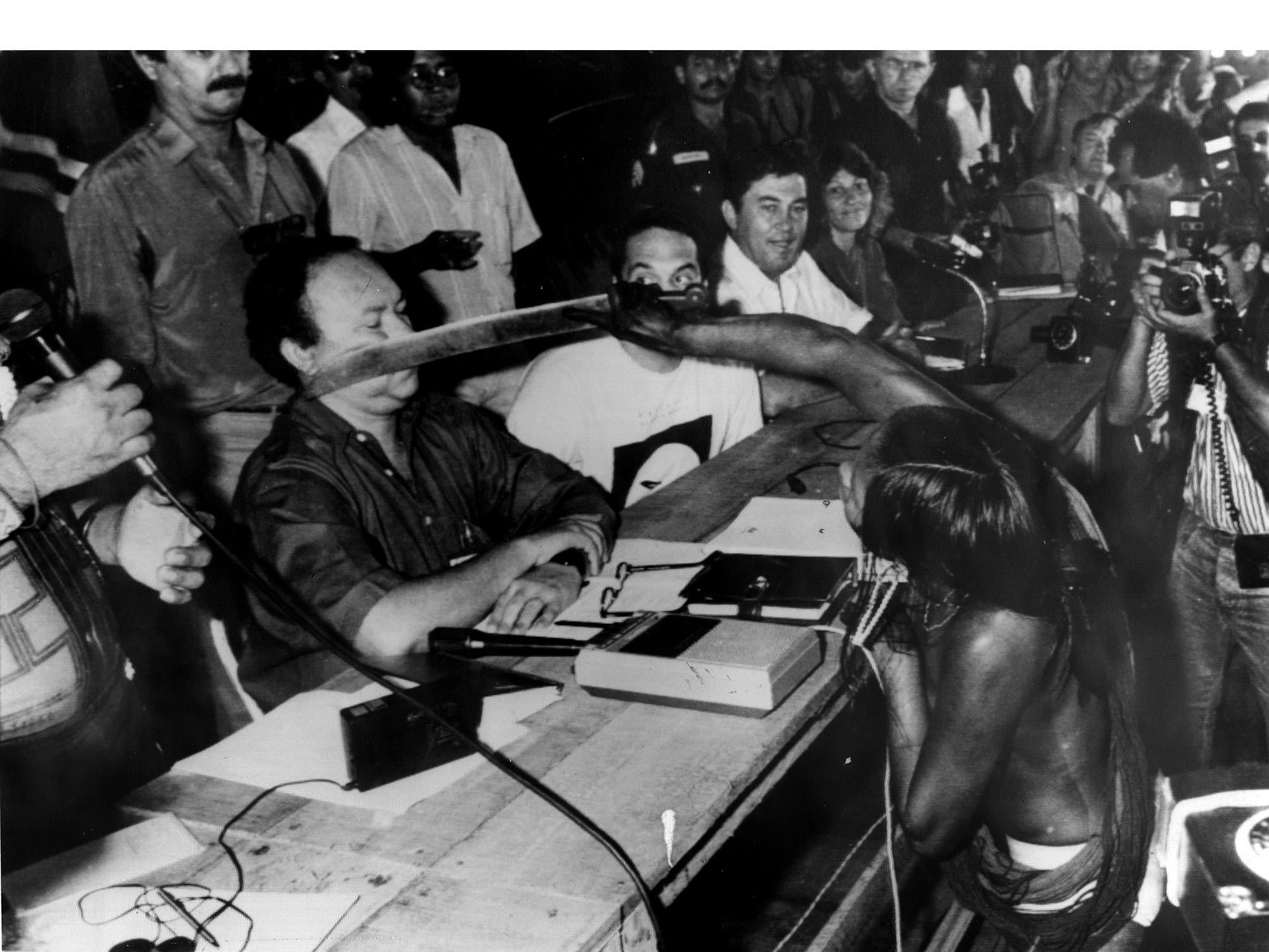 Indigenous woman Tuíre Kayapó at a conference on the construction of the Belo Monte Dam (1989).jpeg