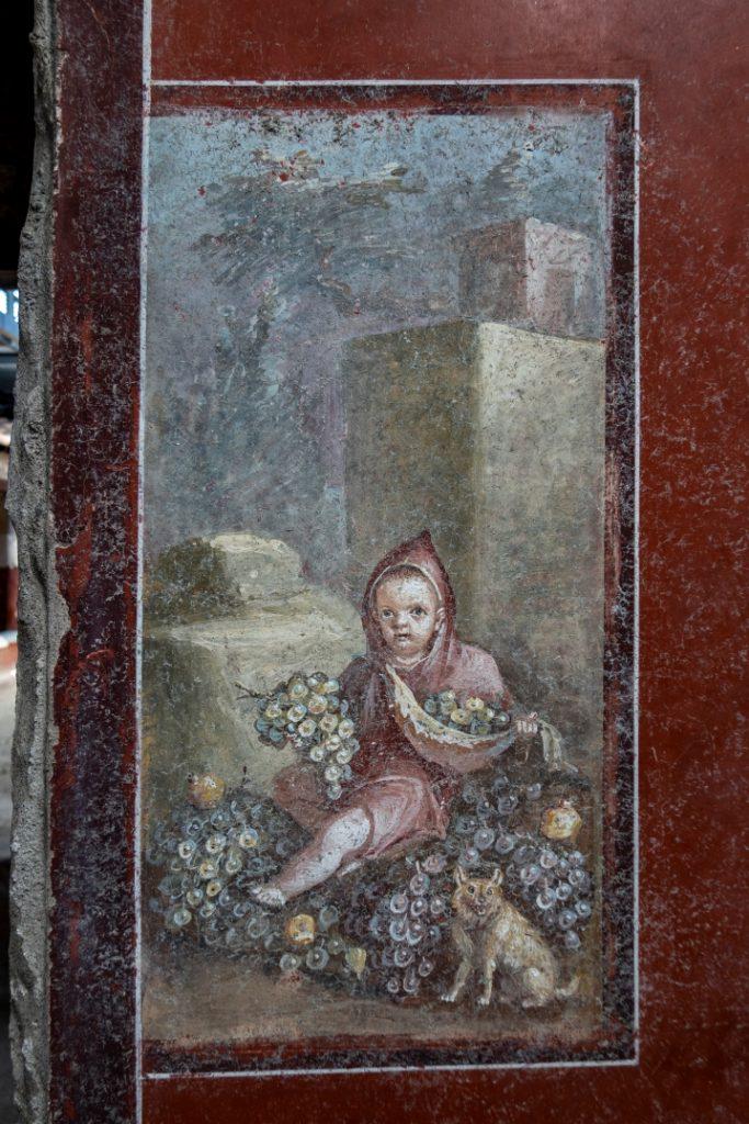 Painting of a Baby and Dog recently discovered in Pompeii.jpeg