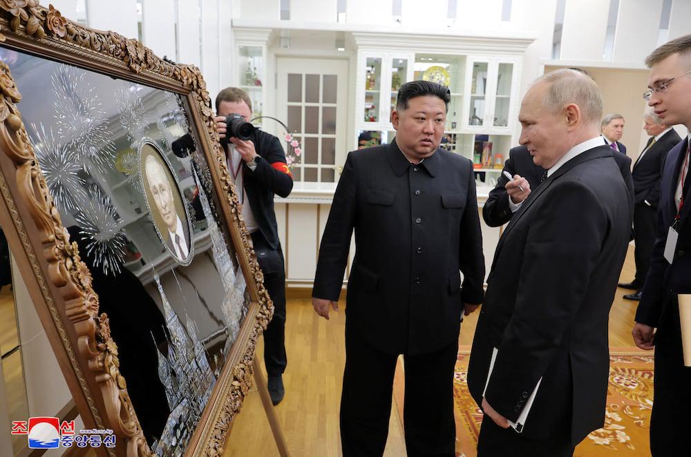 Kim Jong Un gave Putin a portrait on a granite slab.jpeg