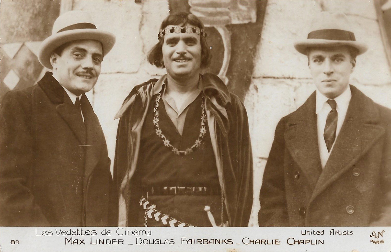 United Artists. Douglas Fairbanks on the set of Robin Hood (1922), with Charlie Chaplin and Max Linder.jpg