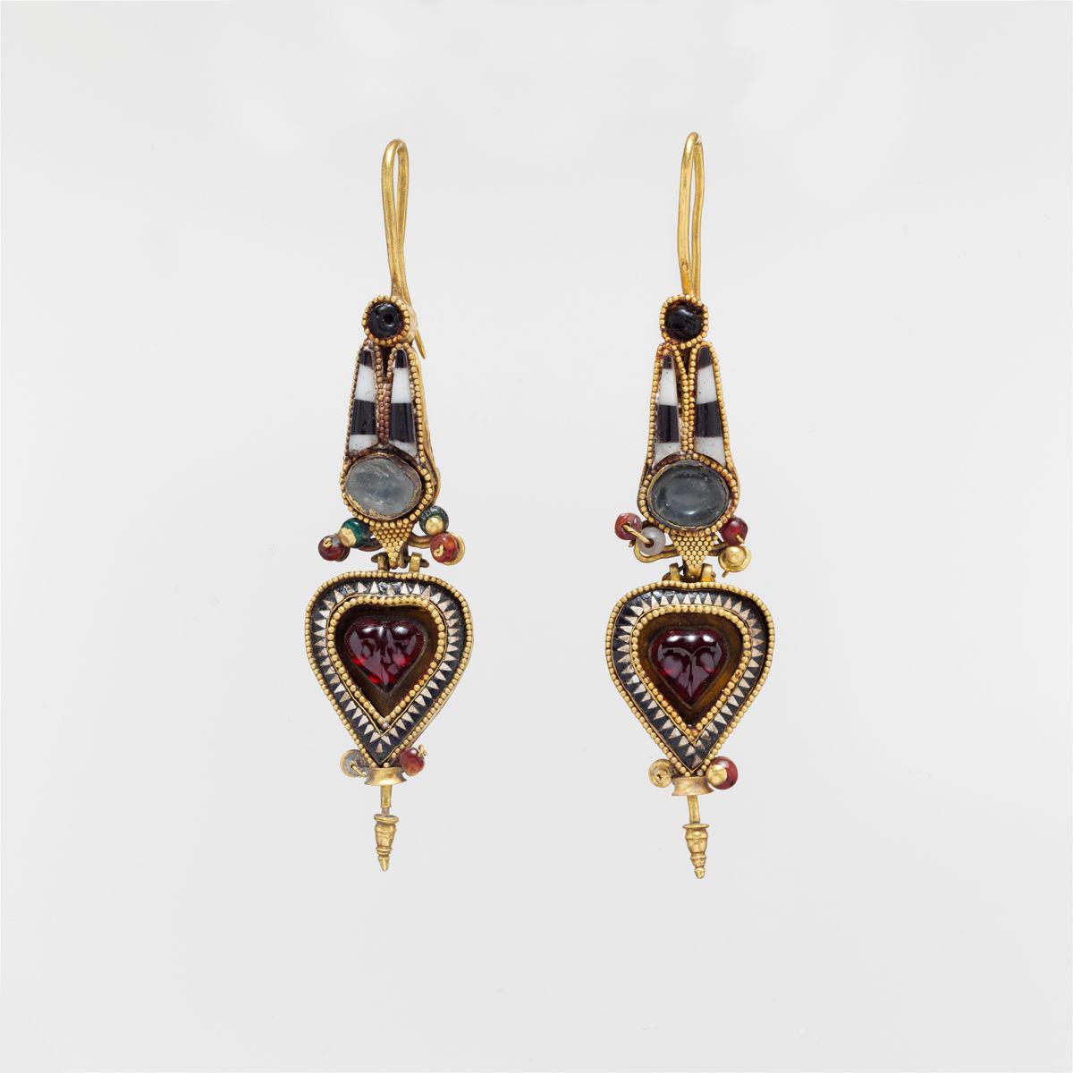Pair of gold earrings with an Egyptian Atef crown set with stones and glass, c. 3rd–2nd century B.C..jpeg