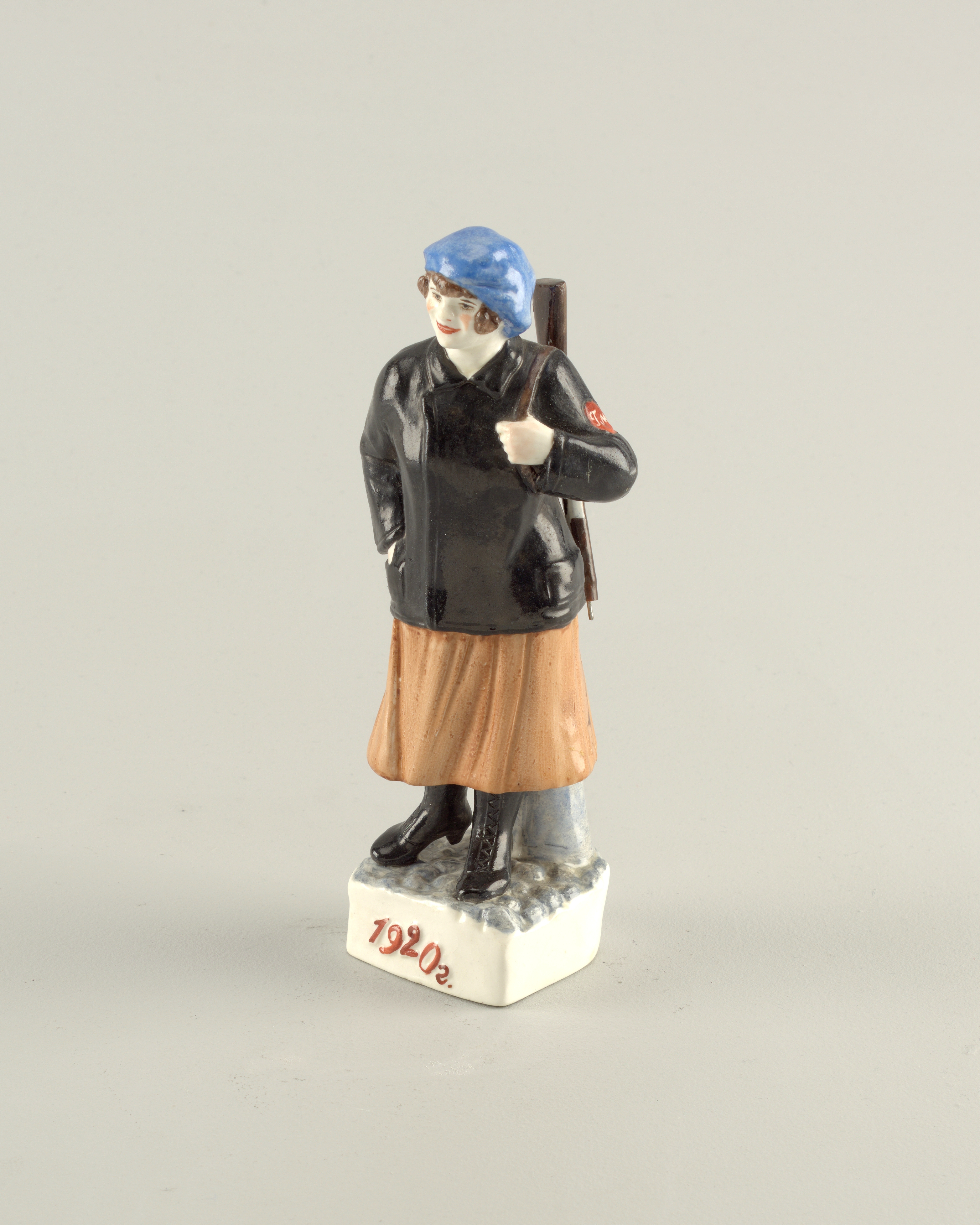 Enameled porcelain armed female militia member made in the Soviet Union, 1920.jpg