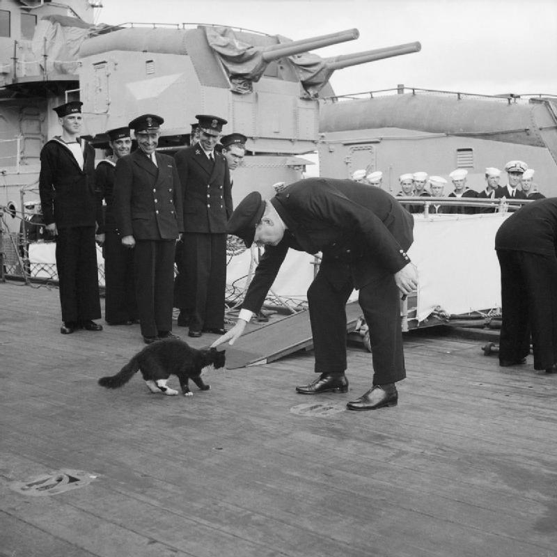 WSC with Blackie on HMS Prince of Wales, August 1941. Four months later Blackie survived the sinking of the battleship by Japanese aircraft off Malaya.jpg