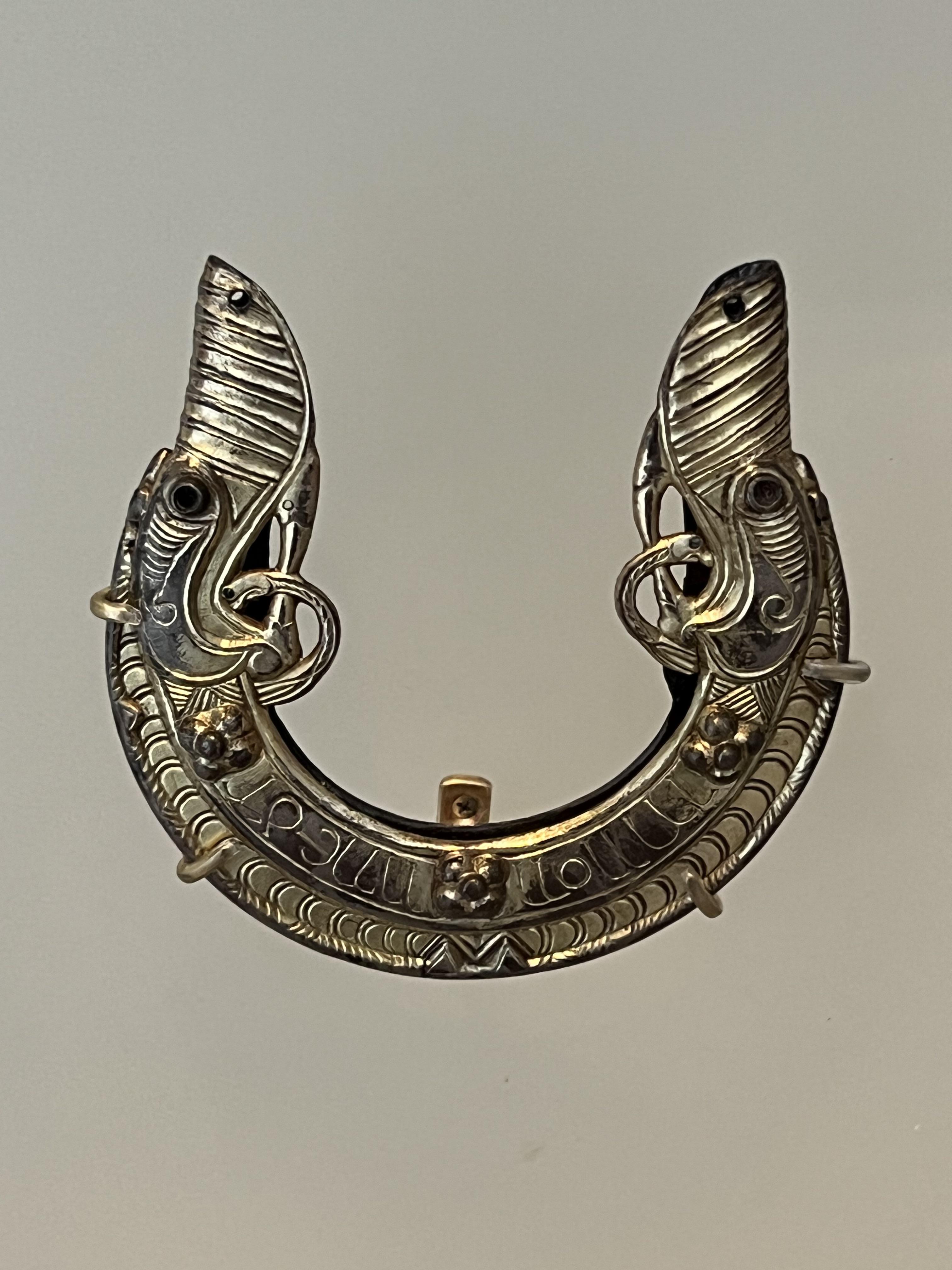 Silver sword scabbard chape that was found as part of St Ninian's Isle Treasure. The entire hoard was made from 750-825 AD and it is now located in the National Museum of Scotland.jpeg