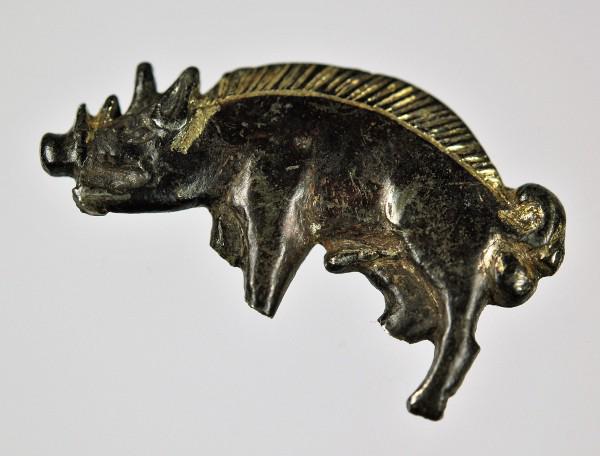 The Bosworth boar, a silver gilt badge, the emblem of Richard III, found at the site of the Battle of Bosworth. It may have belonged to one of the king's knights or even to Richard himself. Circa 1485, England.jpeg