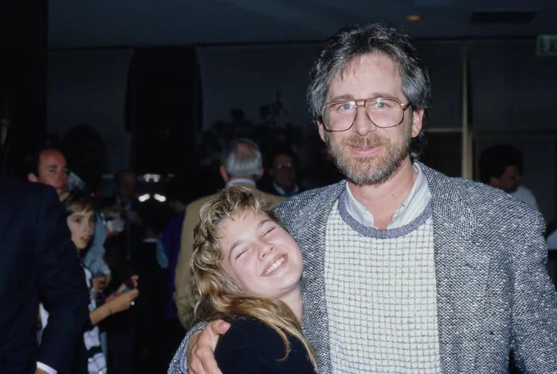 Drew Barrymore with Steven Spielberg . Circa 1982.jpeg