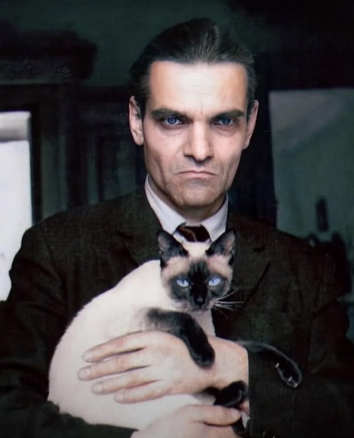 Russian linguist and Mayan script decipherer Yuri Knorozov, holding his cat Asya.png