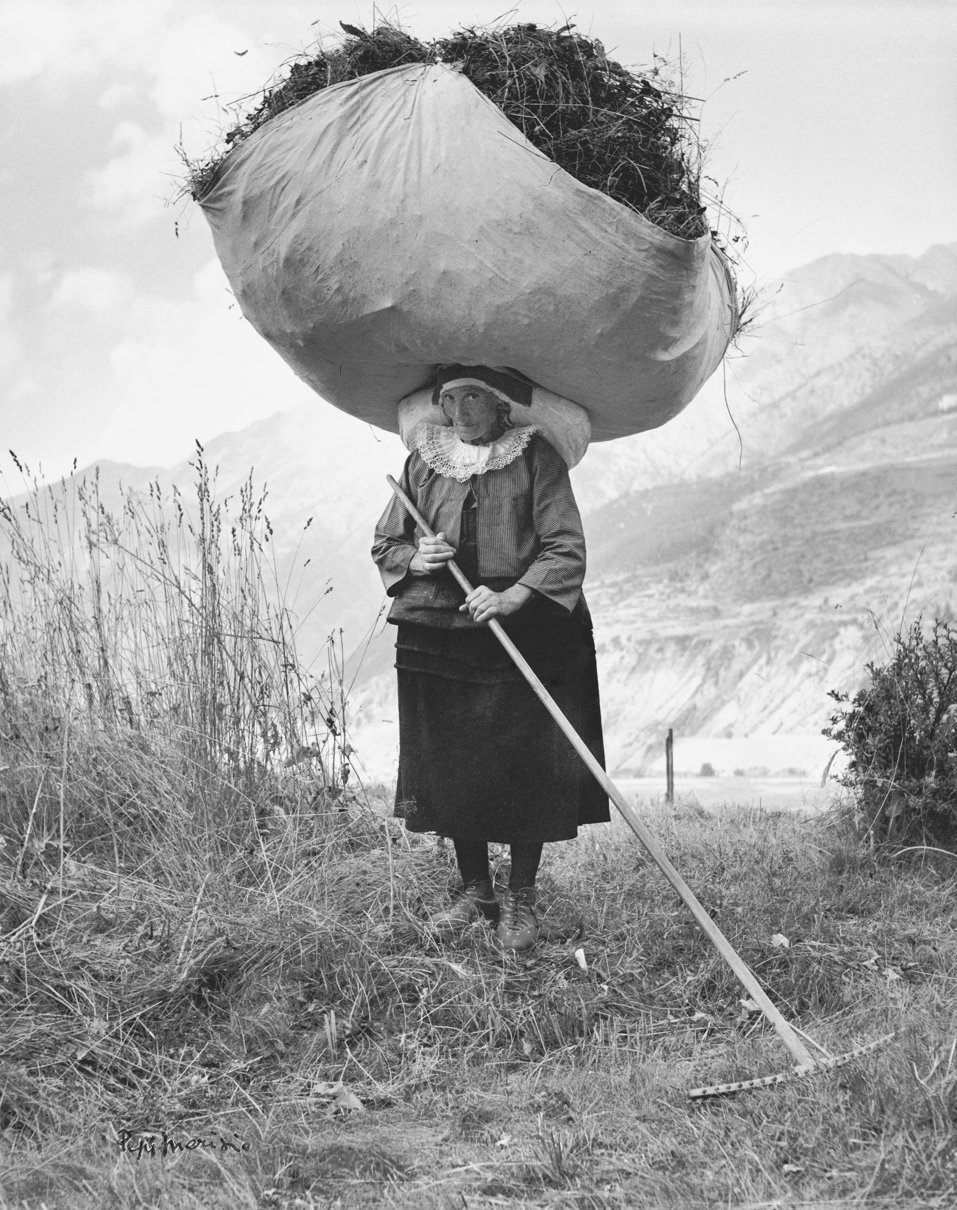 Woman haying in Cogne, Italy, 1959. Photo by Pepi Merisio.jpeg