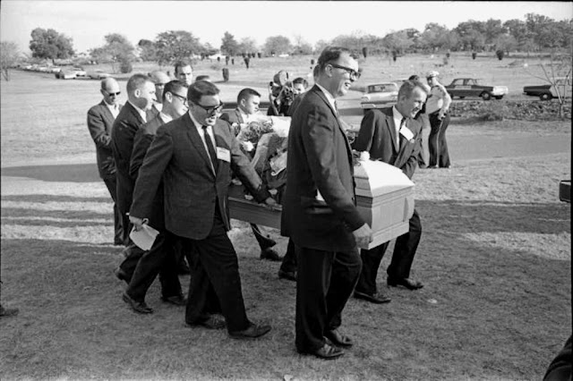 Due to a lack of family and friends in attendance at his funeral, the pallbearer’s of Lee Harvey Oswald’s casket were reporters. November 25, 1963.jpg