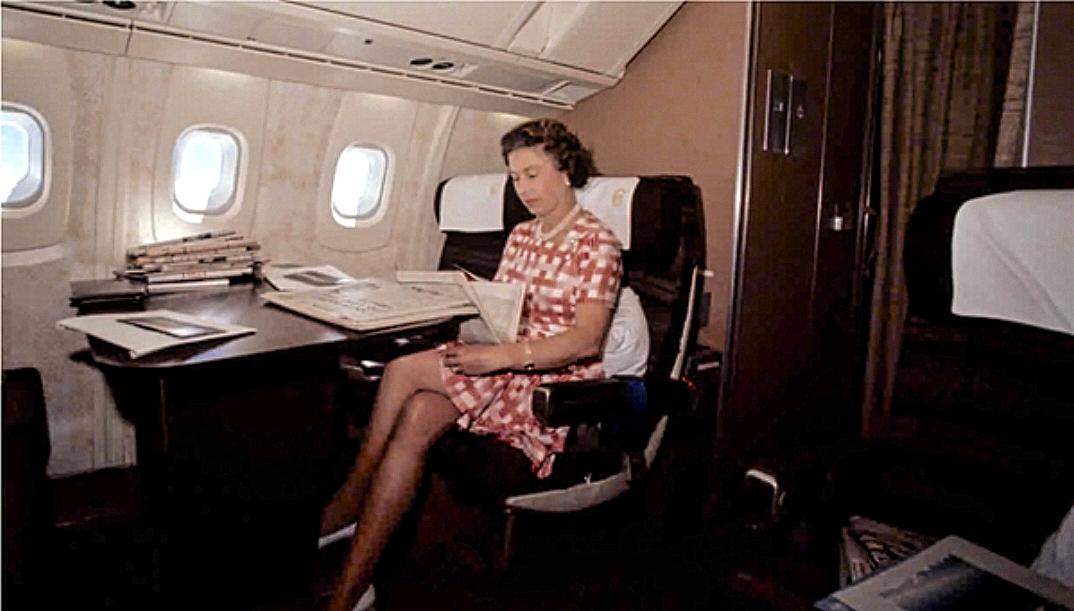 Queen Elizabeth catching up on some reading during her flight home, via Concorde, after her Silver Jubilee tour of Canada in 1977.jpeg