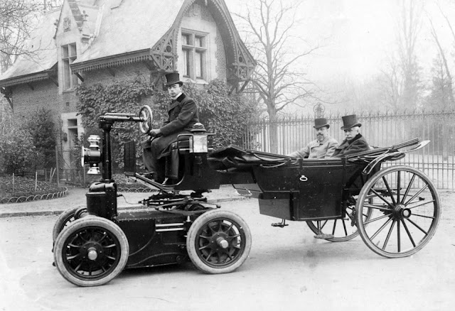 Grand Duke Alexis of Russia’s landau being drawn by a Heilmann electric tractor, circa 1898.jpg