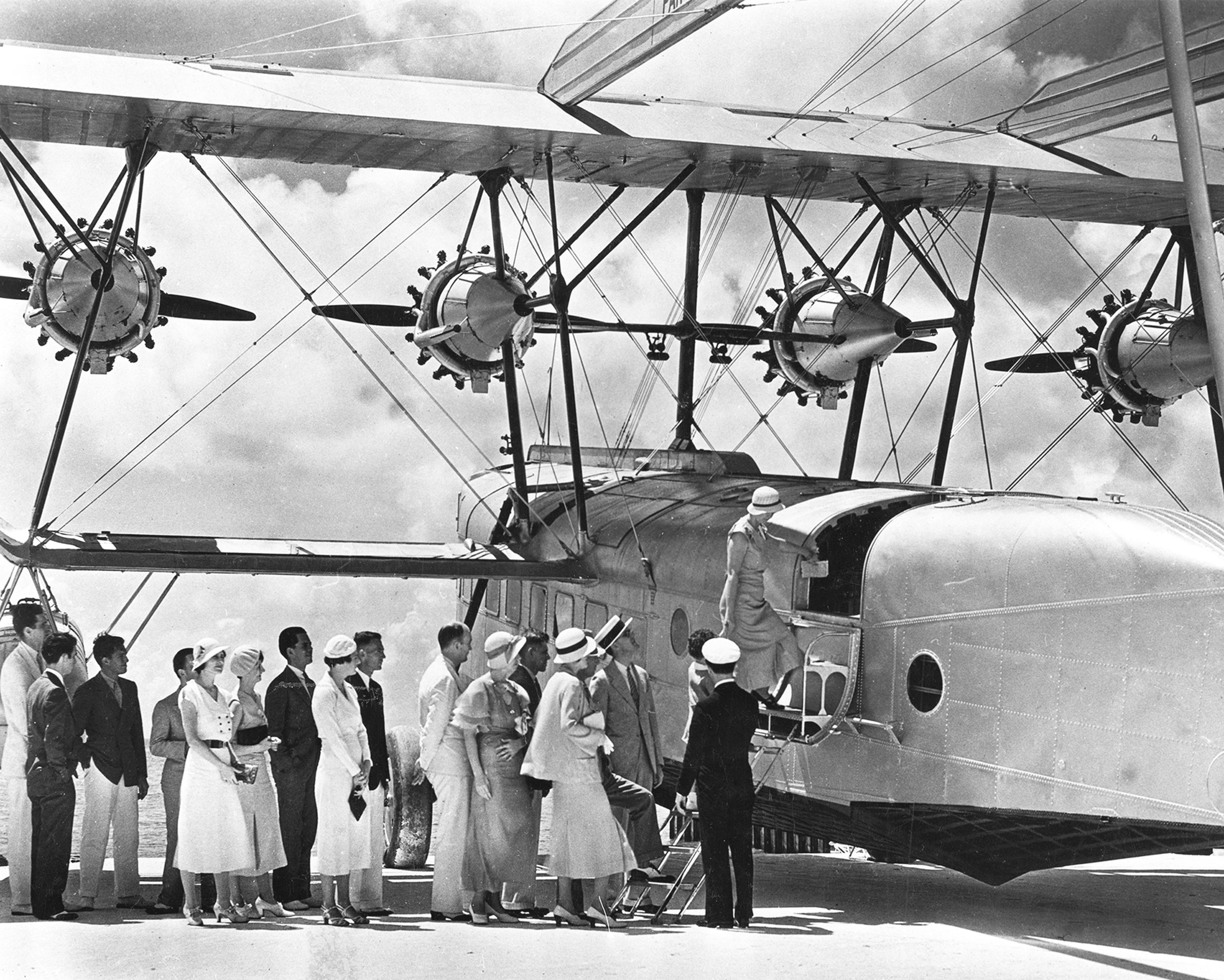 1932. Passengers board a new upgraded Pan American Sikorsky S-40 plane.jpg