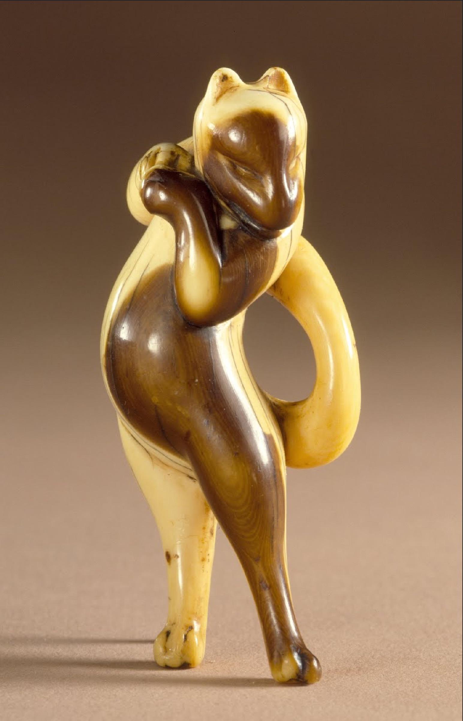 Edo Period Dancing Fox Figurine. Carved ivory and sumo ink stain. Japan. ca. 1775.jpeg