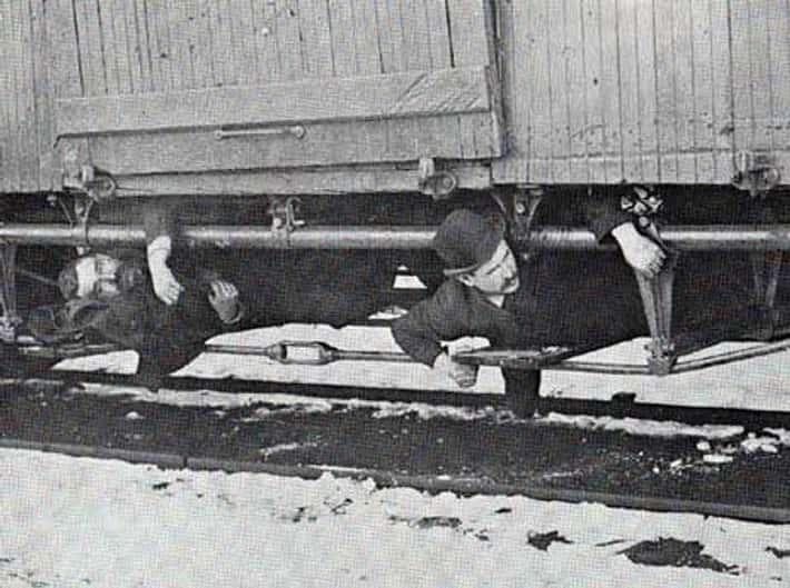 Two Hobos Riding the Rails in 1894.jpeg