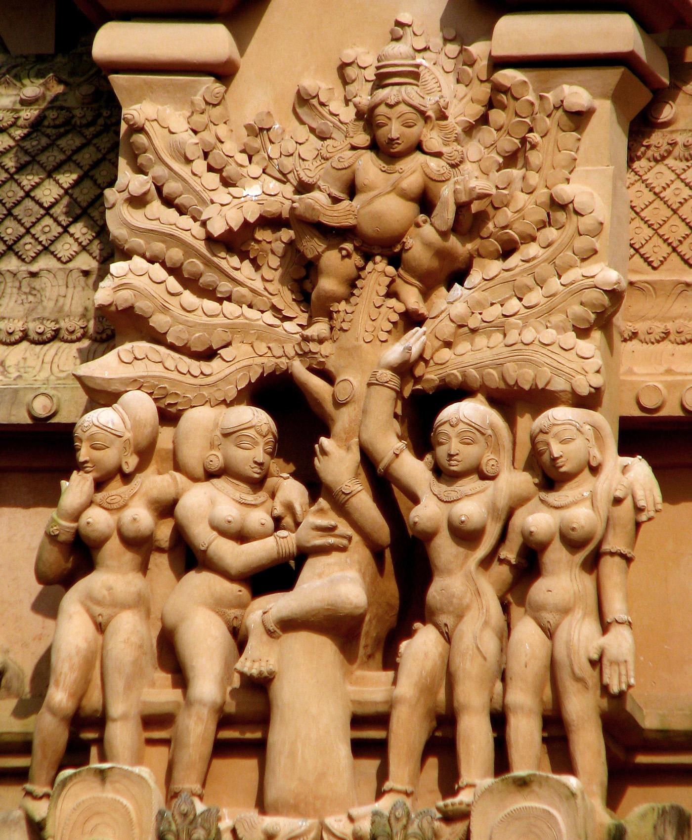 Krishna steals the clothes of the bathing gopis (milkmaids), on a relief at Brihadisvara Temple. Tamil Nadu, India, Chola dynasty, 1010 AD.jpeg