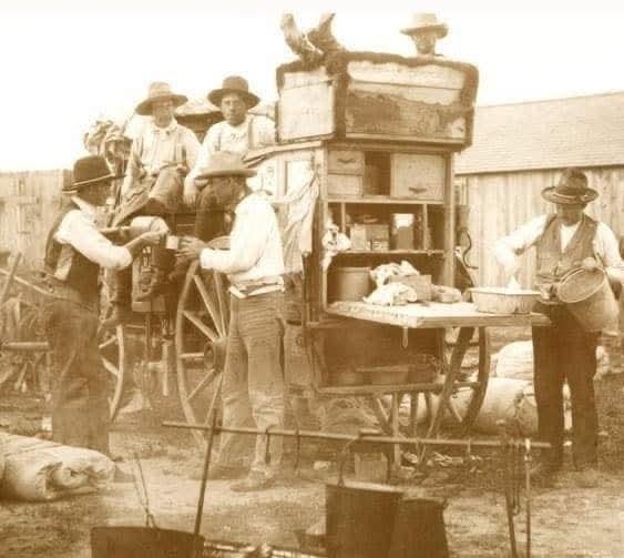 Cowboys eating at the chuck wagon, late 1800s.jpeg