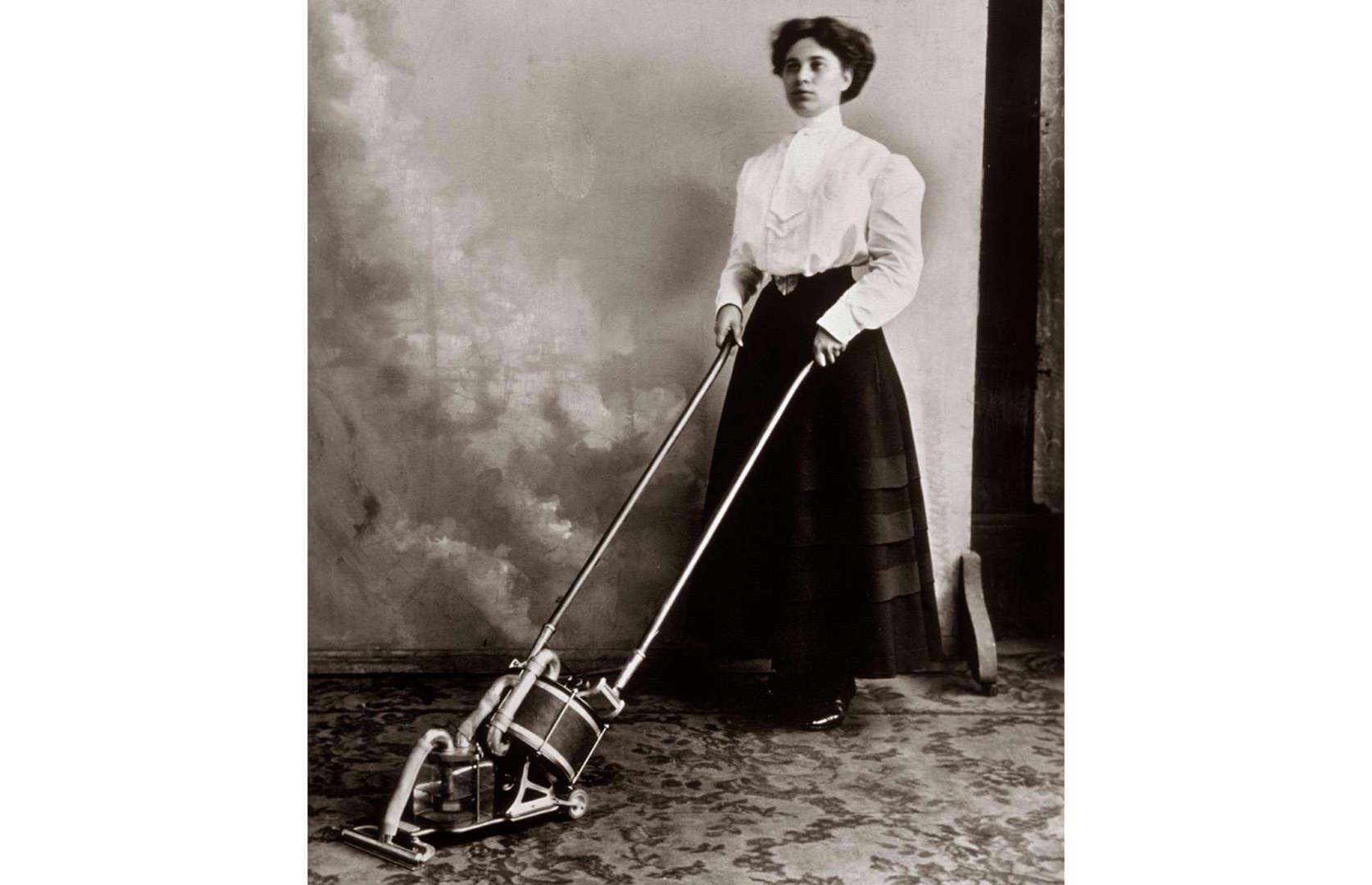 Lady got her New Vacuum Cleaner in 1899.jpeg