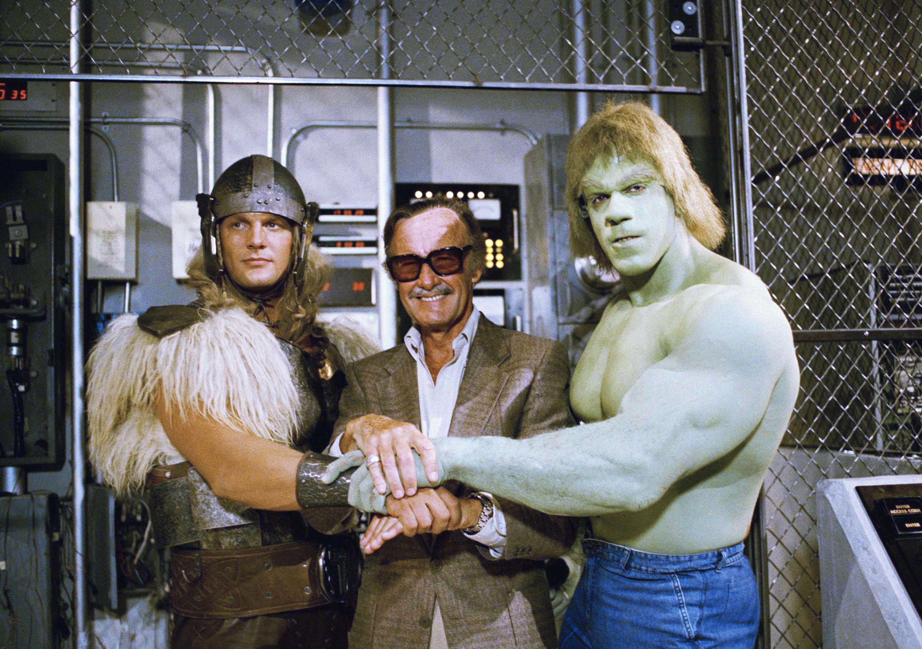 Stan Lee with Eric Kramer and Lou Ferrigno on the set of The Incredible Hulk Returns, 1988.jpeg