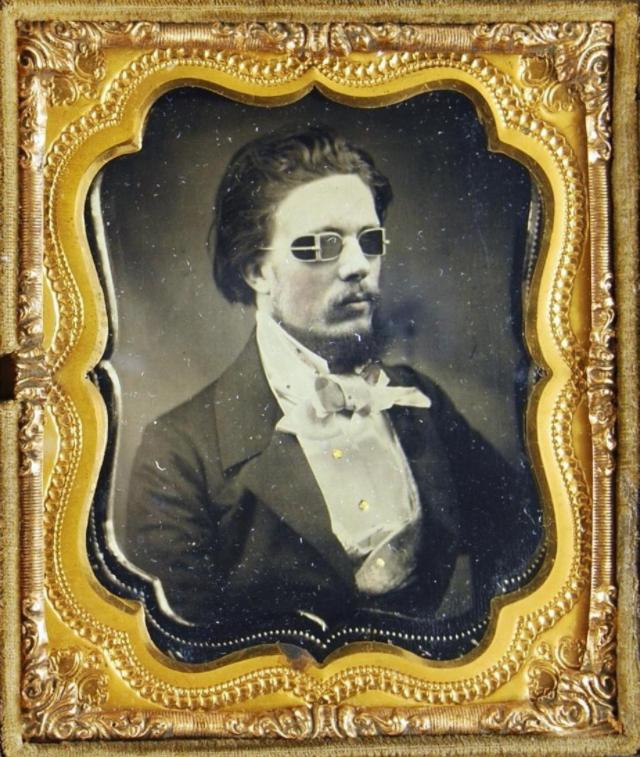 Gentleman using XIX century sunglasses. 1850s-60s.jpg