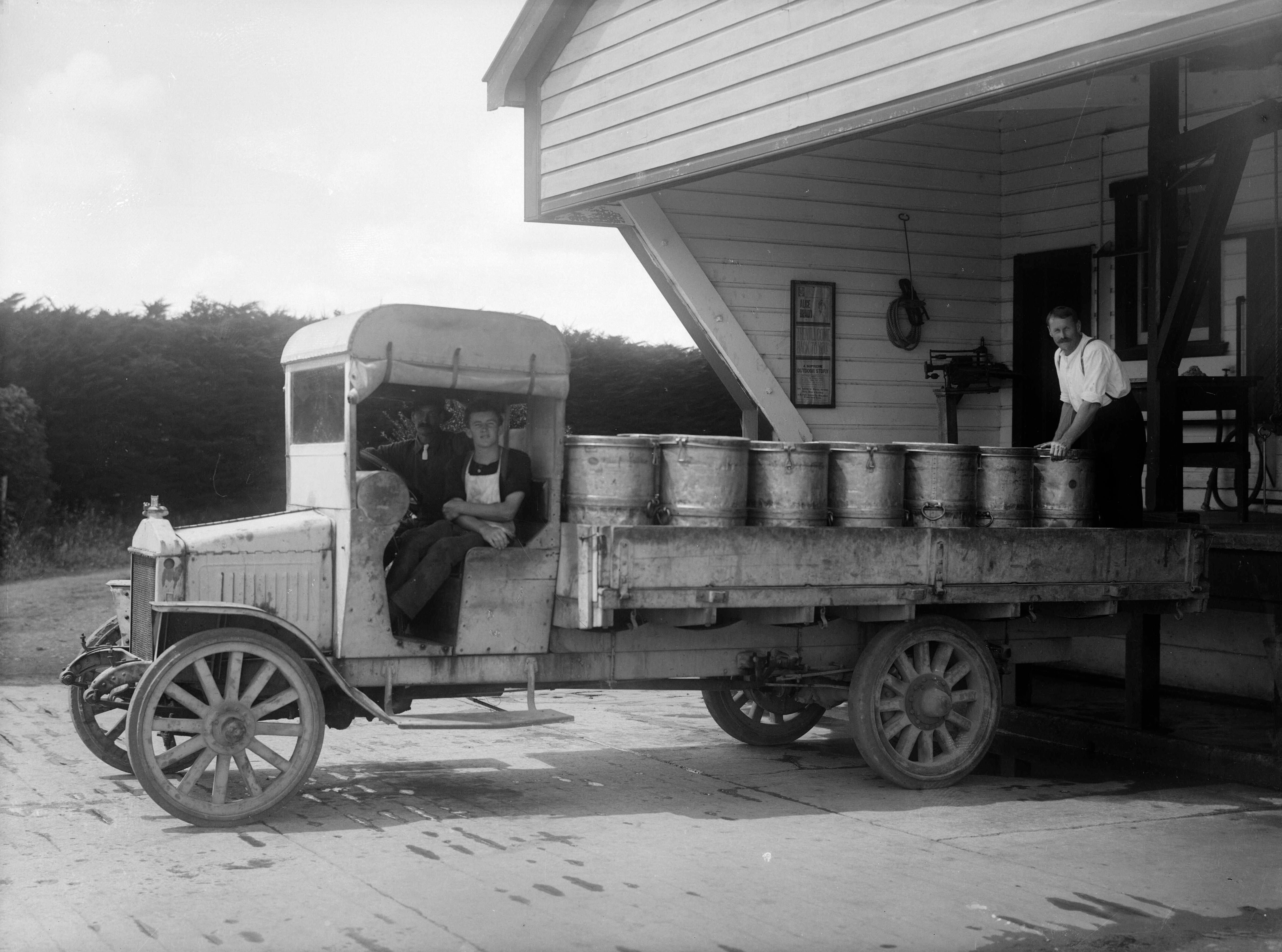 A milk truck at a factory in New Zealand, likely in the Taranaki region. 1918.png