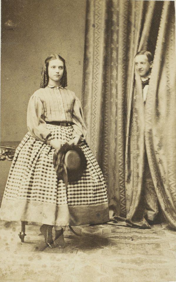 Princess Dagmar (future Empress of Russia) being photobombed by her elder brother Prince William of Denmark (future King of the Hellenes), 1861.jpeg