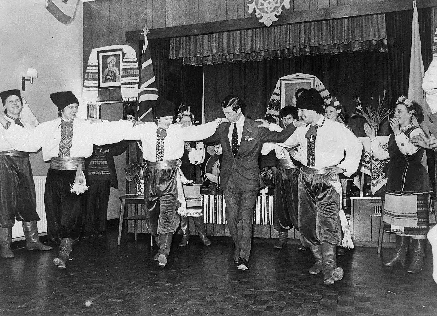 Prince Charles tries folk dancing at The Ukrainian Club, Charnwood Street, Derby, 1981.jpg