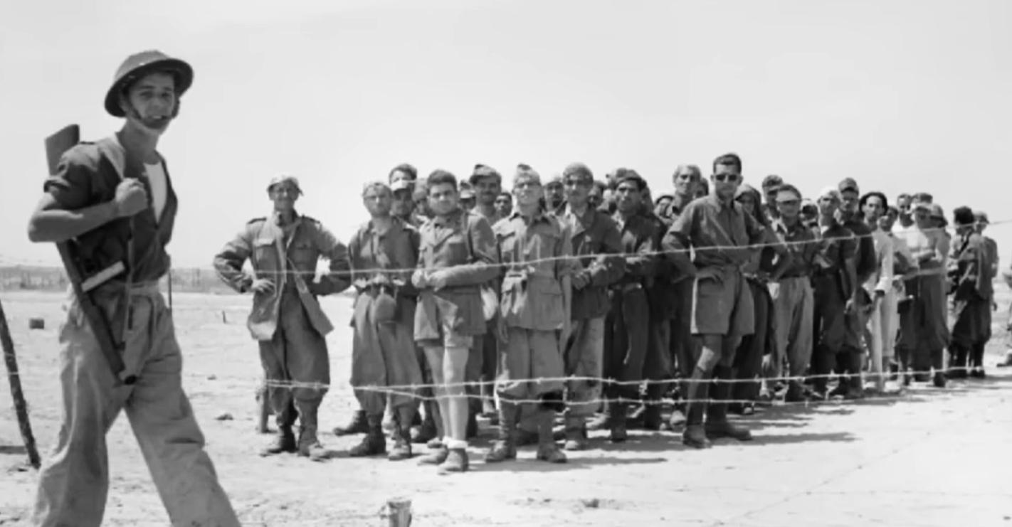 WWII Italian prisoner posing in sunglasses.jpeg