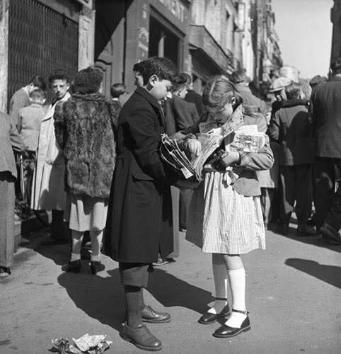 Parisian comic book market, 1949.  This girl is obviously a comic book junkie.  Walt Girdner.jpg